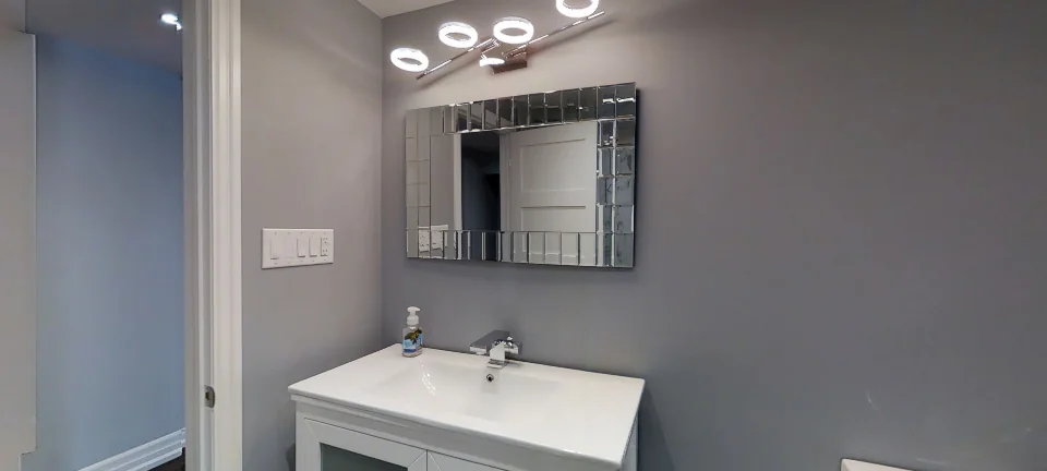 The bathroom, in a finished basement in Aurora by Harmony Basements, captured in 360 degrees