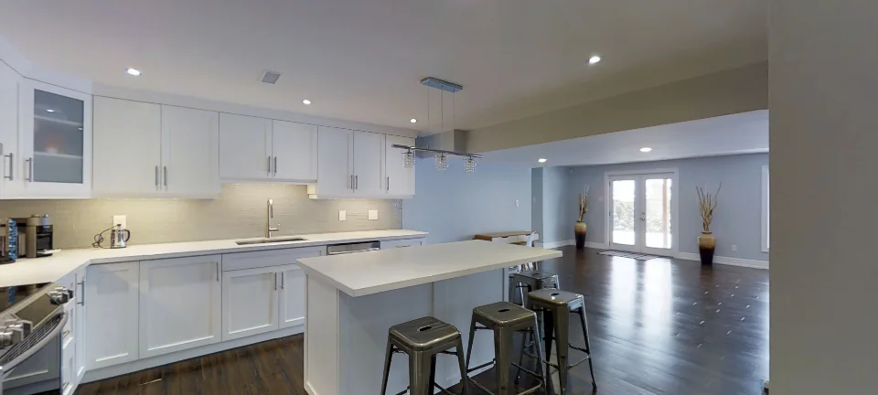 From the kitchen to the hallway, in a finished basement in Aurora by Harmony Basements, captured in 360 degrees