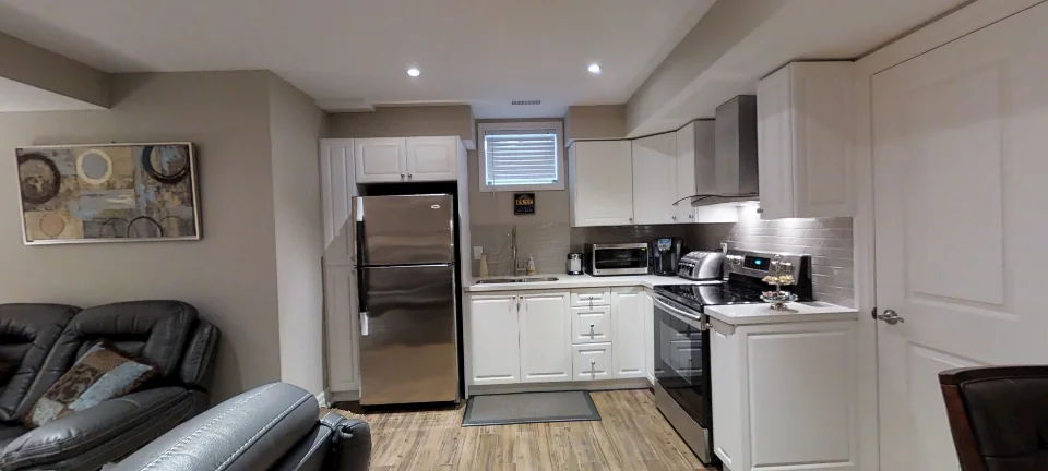 The kitchen, in a finished Harmony basement in King City, captured in 360 degrees