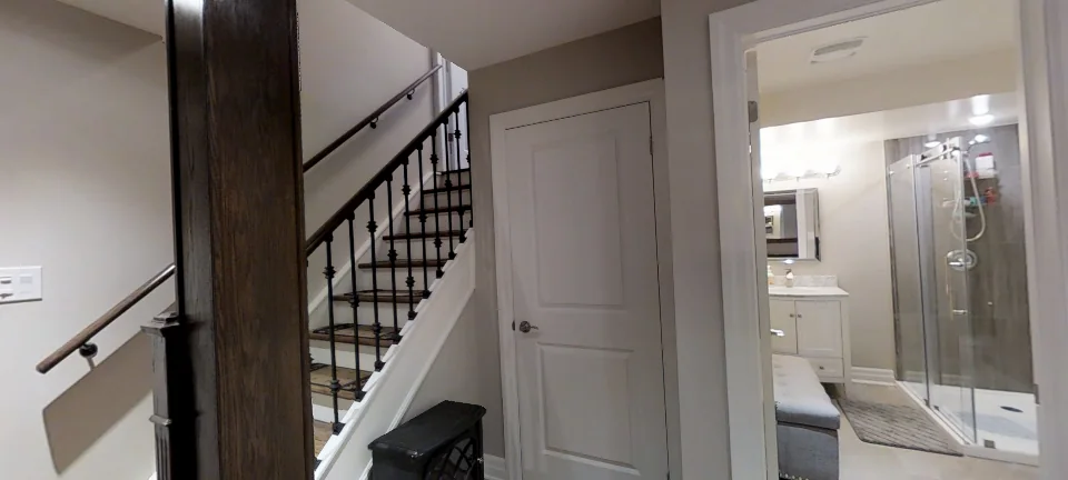 The staircase, in a finished Harmony basement in King City, captured in 360 degrees