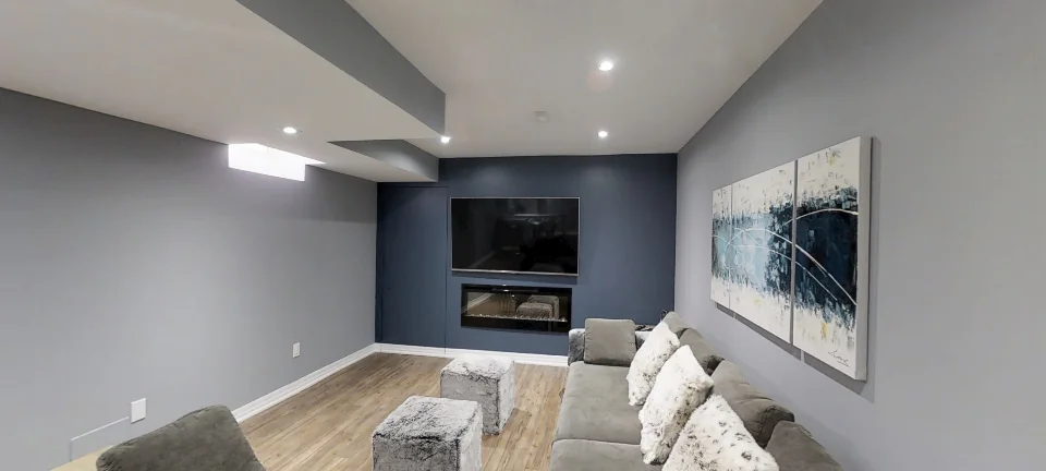 The family room: the TV wall and its linear fireplace, in a finished Harmony basement in Maple, captured in 360 degrees
