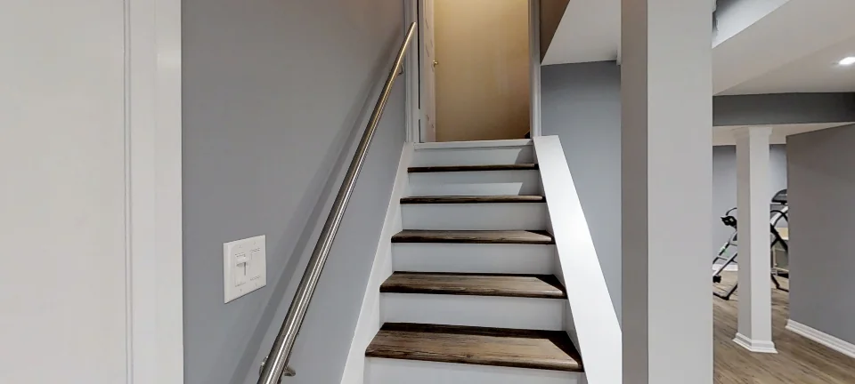 The staircase, in a finished basement in Maple by Harmony Basements, captured in 360 degrees