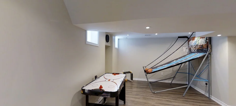 The games area, in a finished Harmony basement, captured in 360 degrees