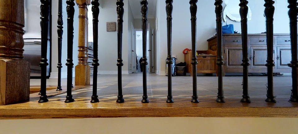 The stair opening, from the floor above, in a finished basement by Harmony Basements, captured in 360 degrees