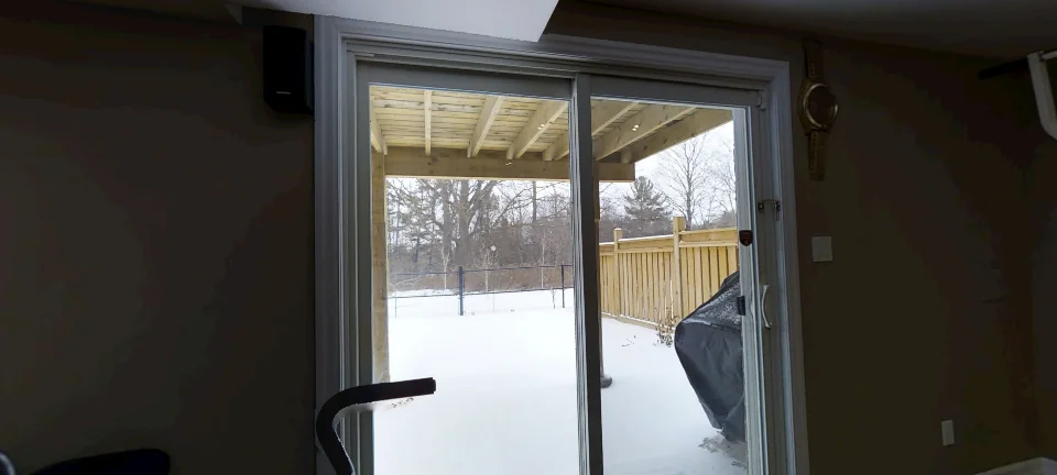 The gym corner and the walkout doors, in a finished Harmony basement, captured in 360 degrees