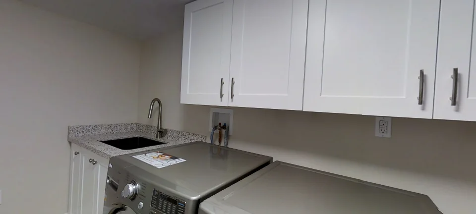 The laundry room, in a finished Harmony basement, captured in 360 degrees