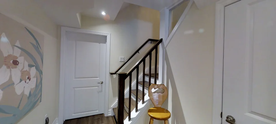 The staircase, in a finished basement by Harmony Basements, captured in 360 degrees