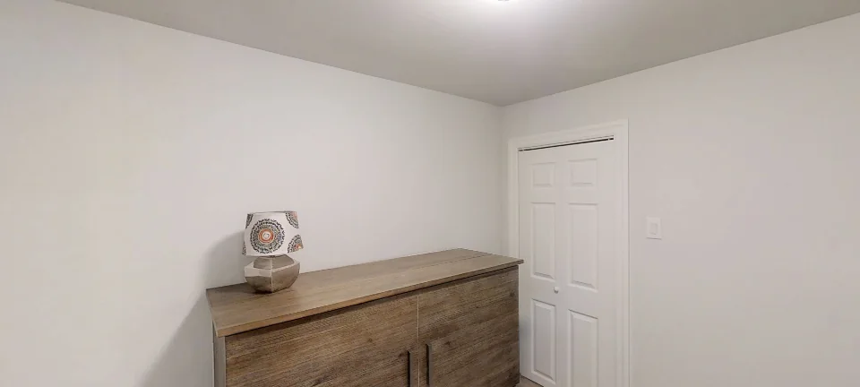 The bedroom, in a finished basement in Oakville by Harmony Basements, captured in 360 degrees