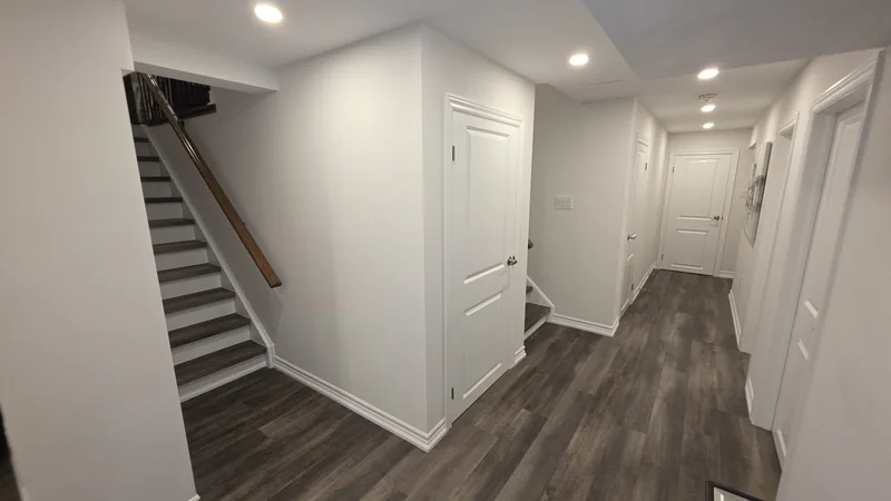 Basement finishing Etobicoke: the hallway, the stairs and the new doors — built in Woodbridge