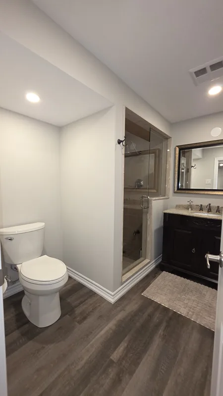 Renovated basement Bolton: the bathroom — built in Woodbridge