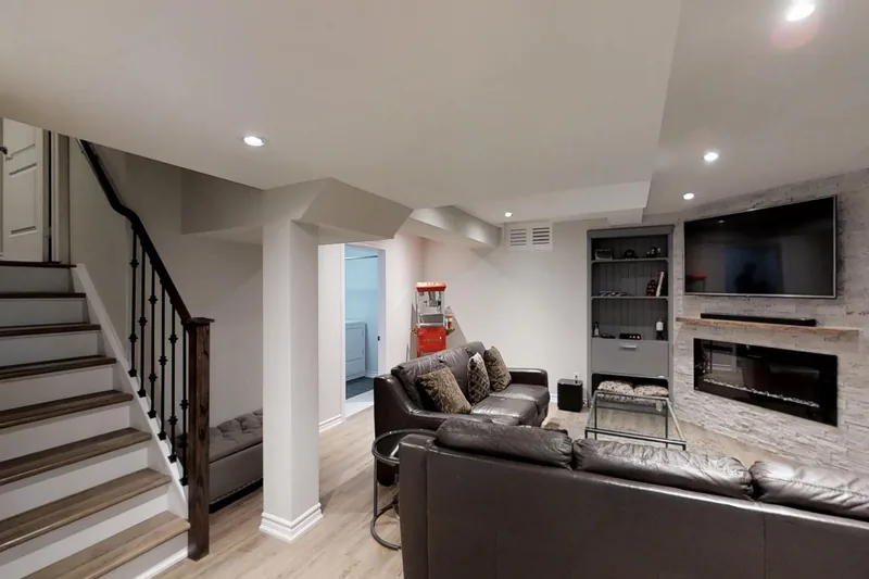 Media wall: a finished Harmony basement, in the 3D tour