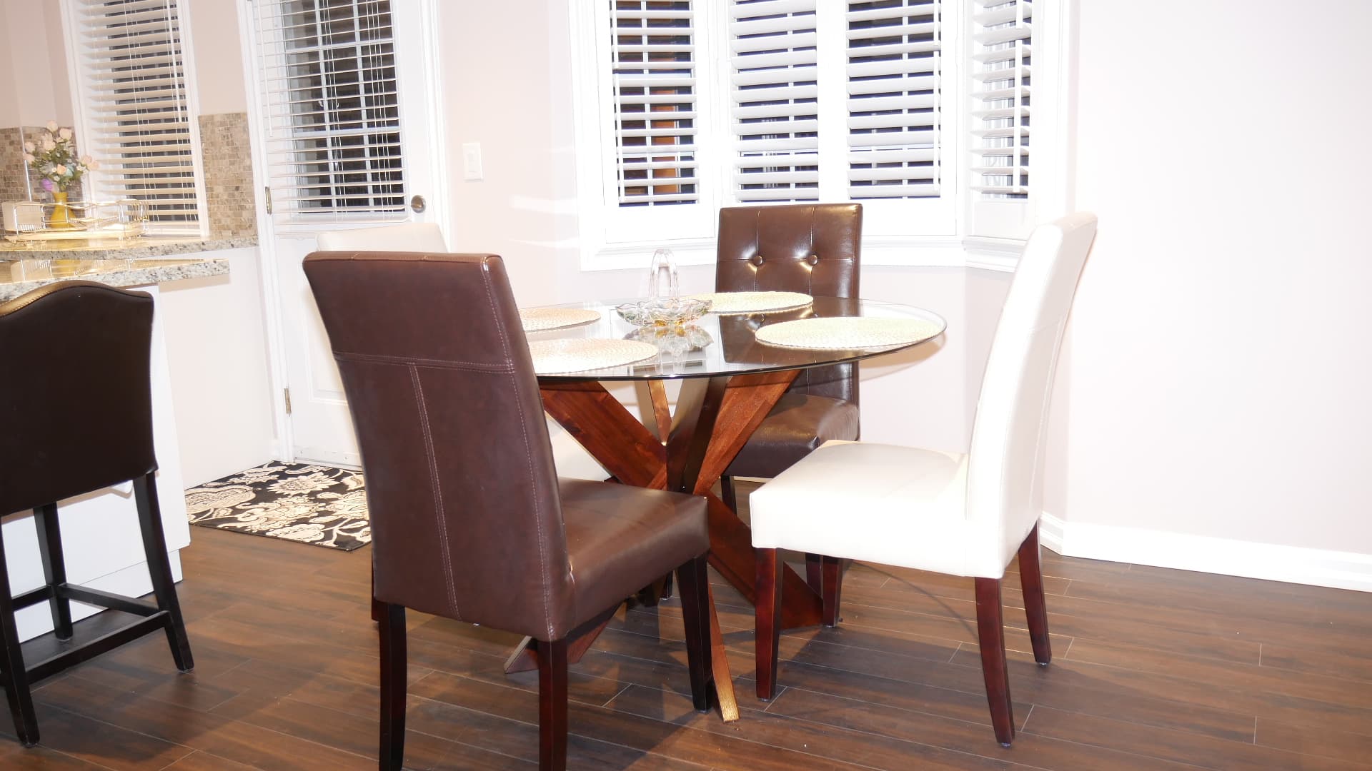 The dining area in a finished basement by Harmony Basements