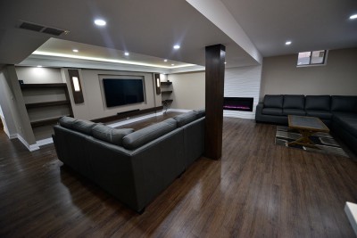 C, by Harmony Basementseiling pot lights and wall build in shelves with back light basement finishing innisfil
