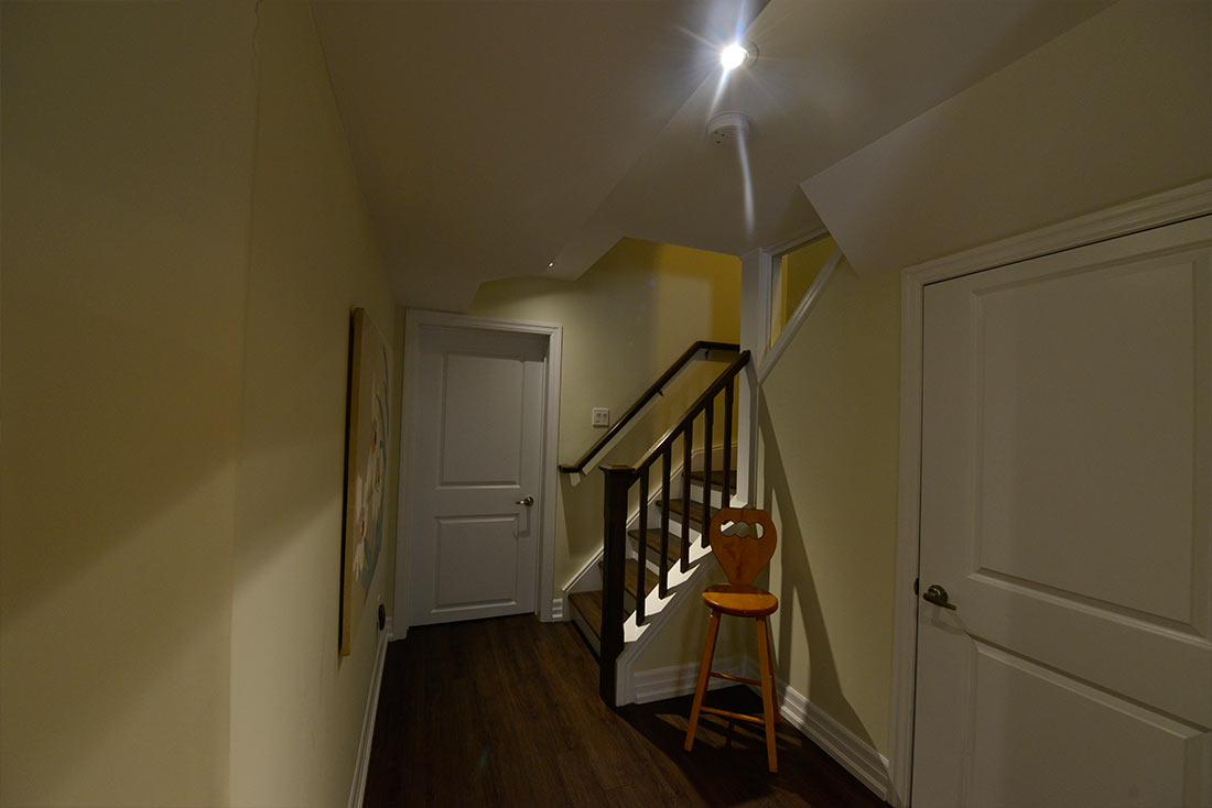 The staircase in a finished basement by Harmony Basements