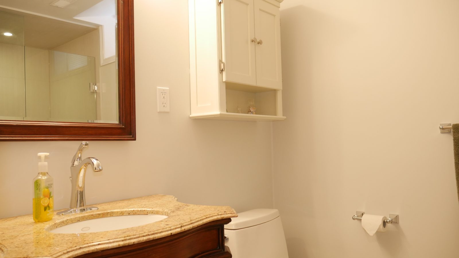 The bathroom in a finished basement by Harmony Basements