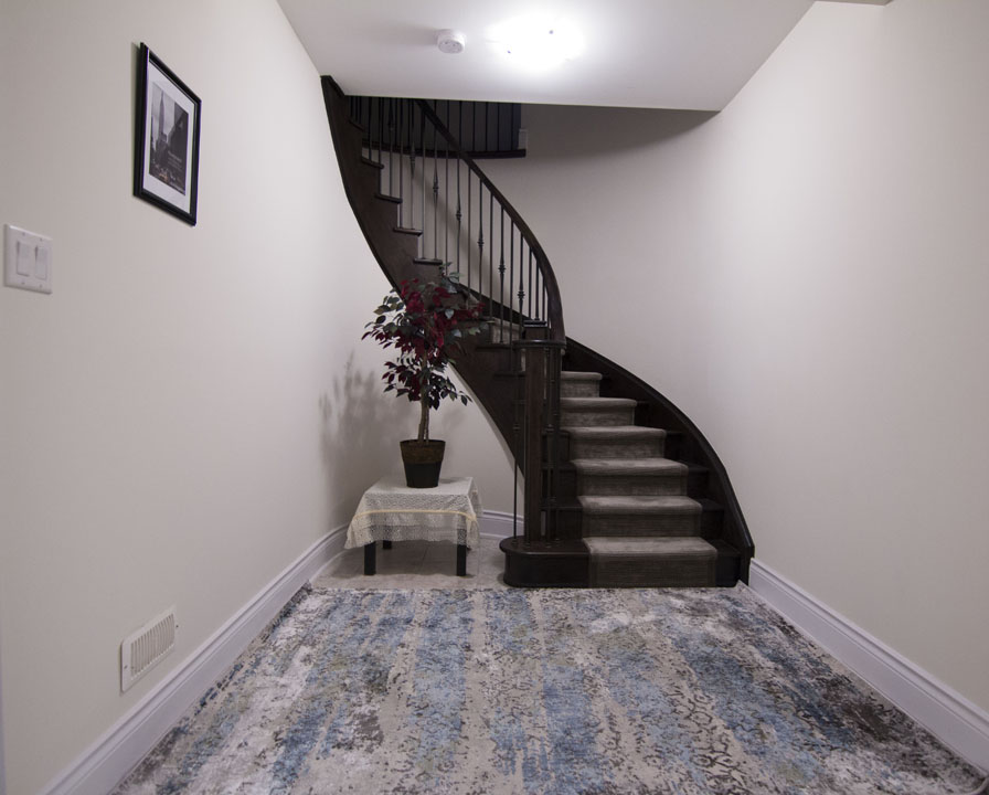 Basement idea, the stairs: a finished basement in Vaughan by Harmony Basements