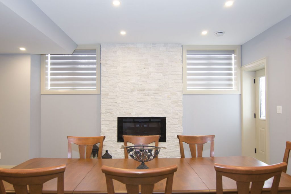 Basement idea, the dining area: a finished basement in Woodbridge by Harmony Basements
