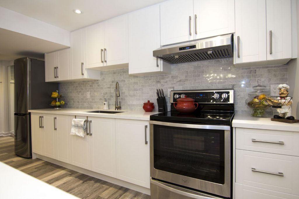 Basement idea, the kitchen: a finished basement in Scarborough by Harmony Basements