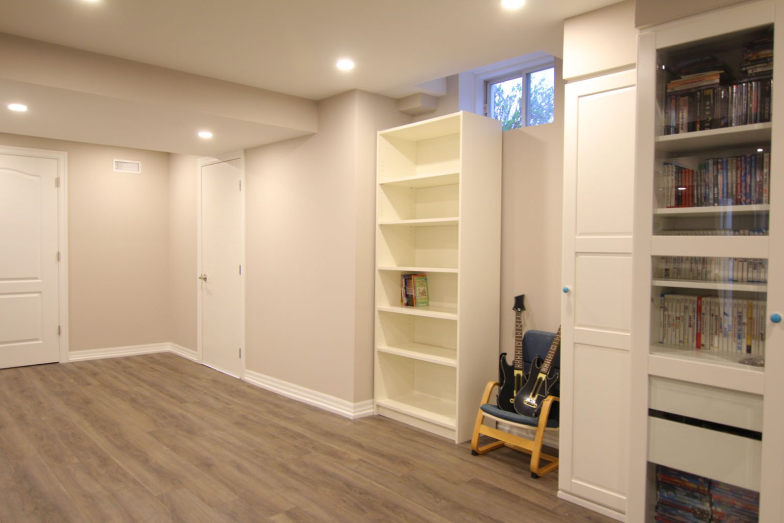 Basement idea, the built-in storage: a finished basement in Burlington by Harmony Basements