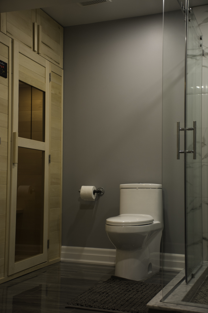 The shower and the sauna in a finished basement in Oakville by Harmony Basements