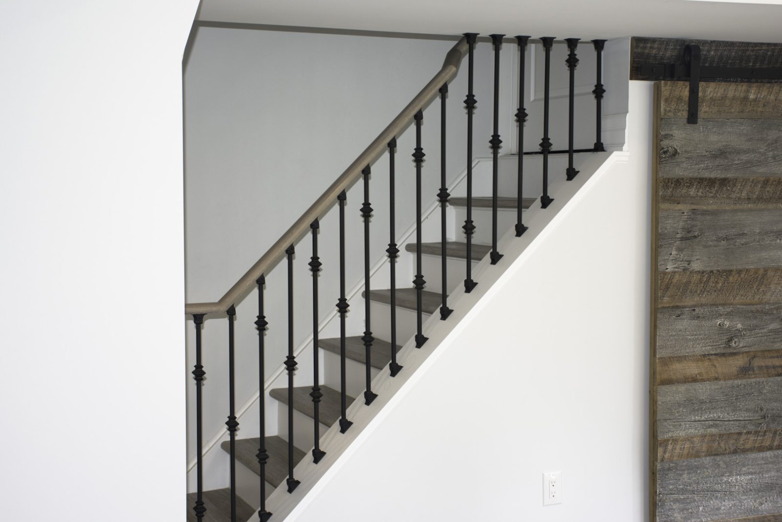Basement idea, the stairs: a finished basement in Oakville by Harmony Basements