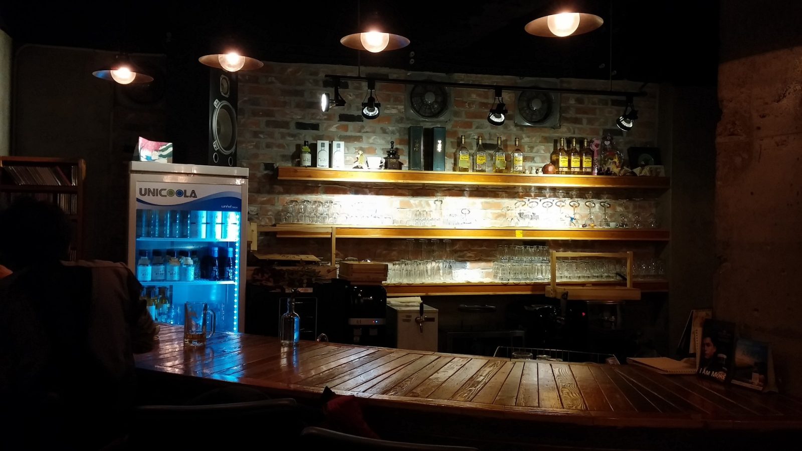 Custom basement with mini fridge and luxury bar basement bar ideas burlington