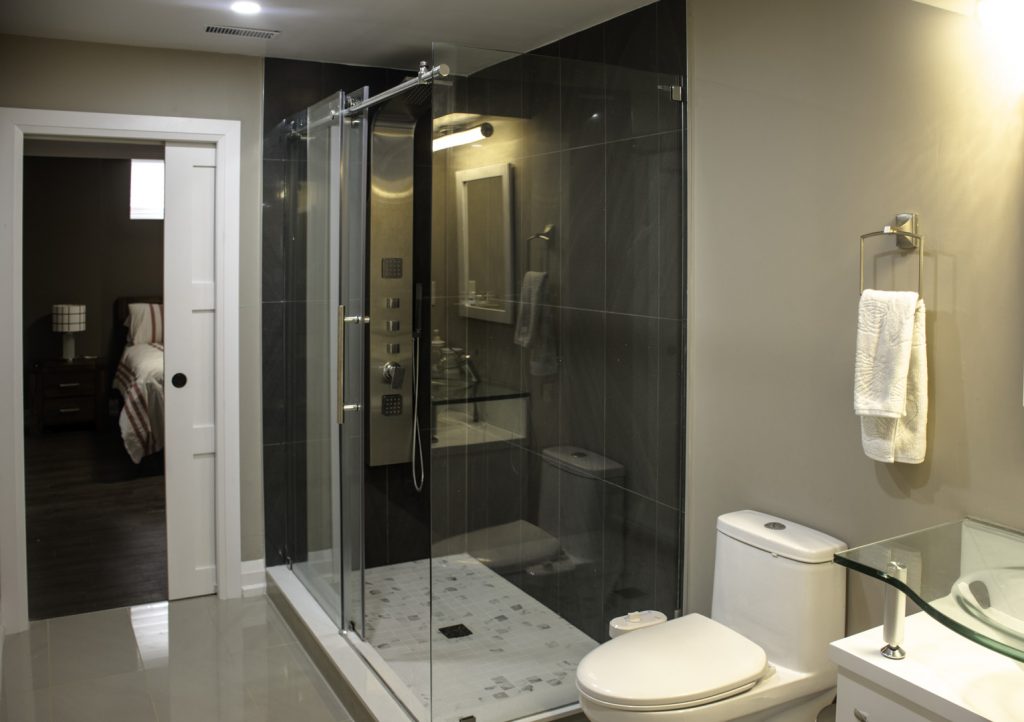Amazing Bathroom in Custom Basement by Harmony Basements Renovation Newmarket