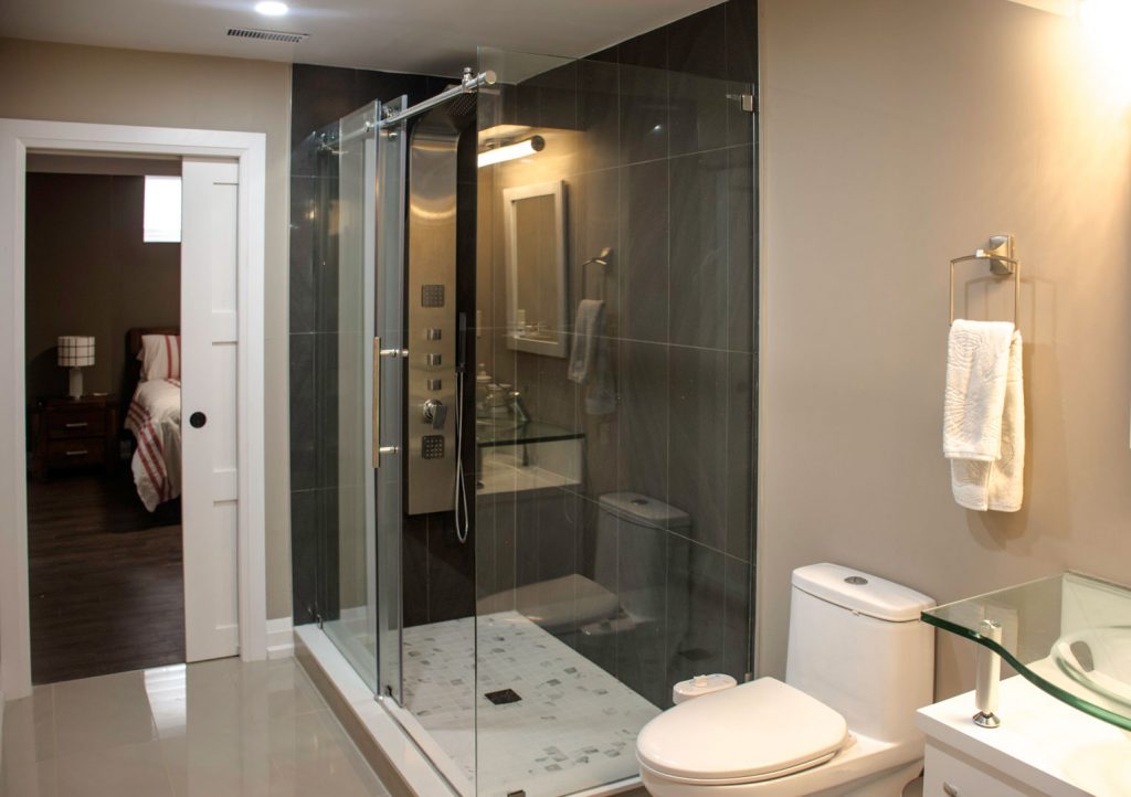Bathroom Renovation in Custom Basement by Harmony Basements Burlington