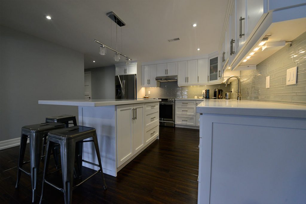 Classic Kitchen with Backlit Kitchen Cabinets - Basement Renovation Contractors Aurora