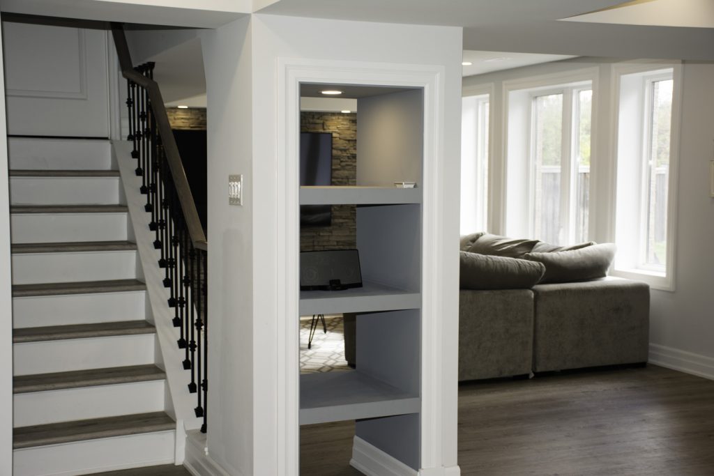 Custom Shelves in Amazing Basement Remodeling Project Burlington