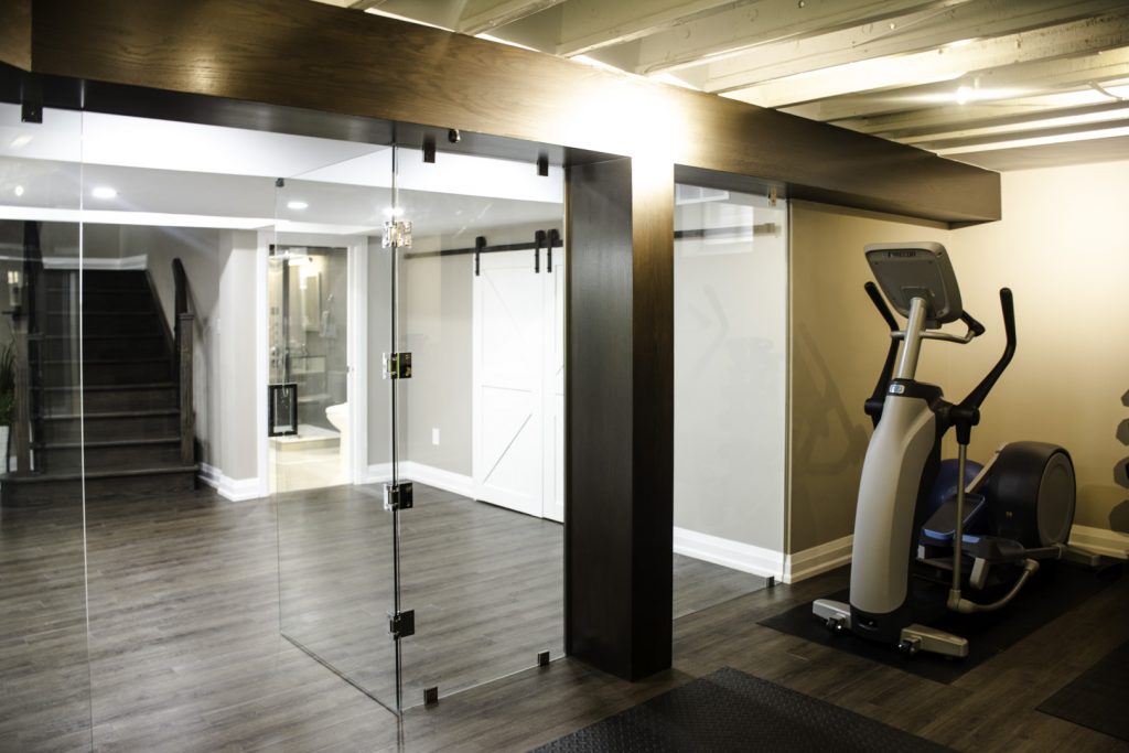 Amazing Glass Doors in Basement Gym - Basement Remodeling Vaughan