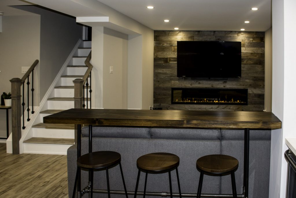 Wooden Wall Decor and Build in Fireplace in Basement Remodeling Project Woodbridge