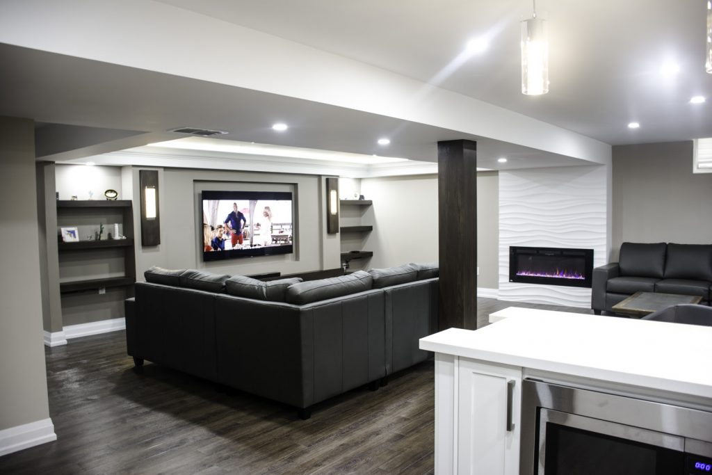 Luxury Living Room with Build in Fireplace - Basement Renovation Company Bradford