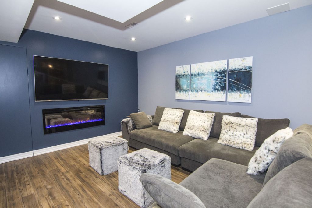 Amazing Family Room in Custom Basement by Harmony Basements Hamilton