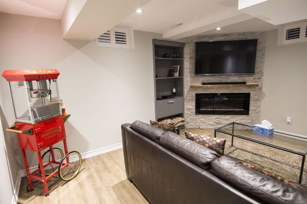 Custom Basement with Wall Units and Popcorn Machine - Basement Finishing Woodbridge