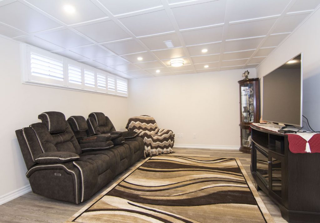 Modern Basement with Waffle Ceiling Decor- Basement Remodeling Burlington
