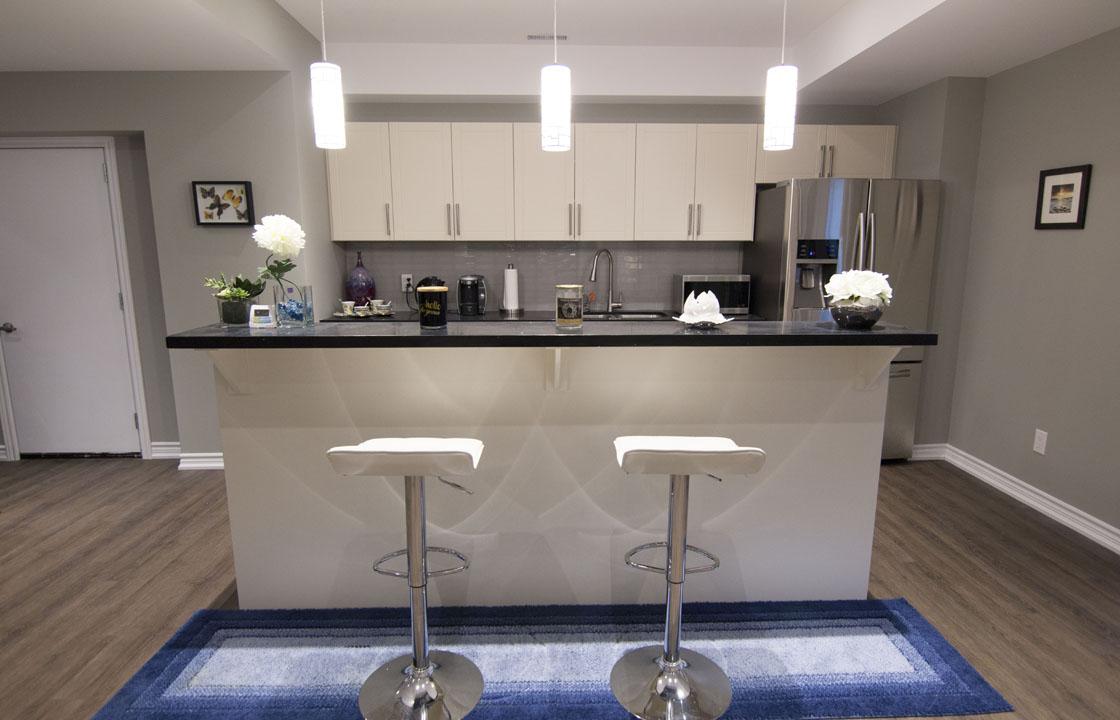 Basement kitchen island in Concord, Vaughan, by Harmony Basements