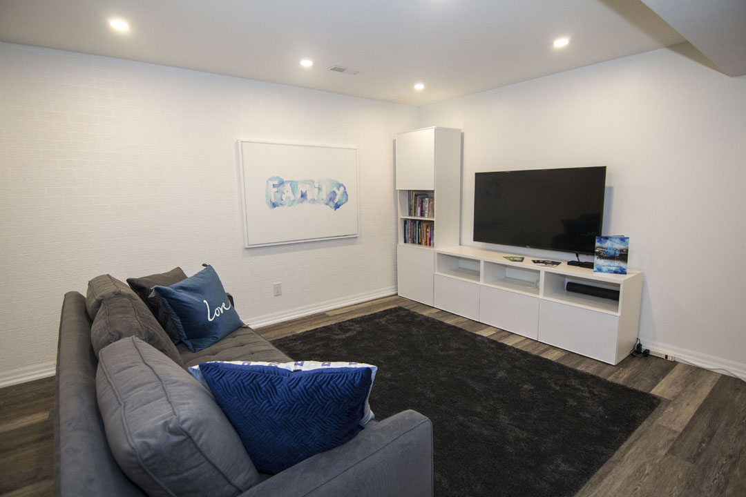 Basement media wall in Richmond Hill: a built-in media unit, by Harmony Basements