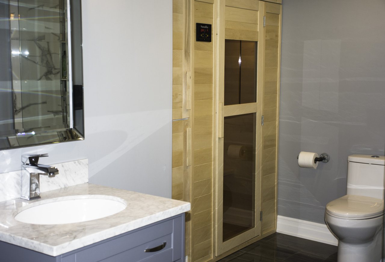Basement sauna ideas for Orangeville: a built-in sauna in the bathroom &mdash; a walkout basement we built in Oakville